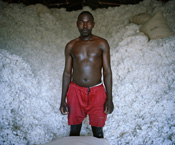 David Chancellor // Cotton BioRe Tanzania Ltd, organic, cotton, Meatu district, northern Tanzania. agriculture rainfed farming, income, food crops, home consumption, production methods, seeds, seed, bio-pesticides, chemical pesticides, pesticide, relay sowing, drought, inspections, cultivation techniques, pest control, ox-drawn weeders farmer,sieved, inspected, weighed, cash, Bibiti Ginnery, lint, Dar-es-Salaam, benefit, price premium, chemicals, soil, crop rotation, water holding capacity, labour, labor, local, village, villages, employer, employee, opportunity, training, ecosystem, ecofriendly, economy, micro finance, green, environment
