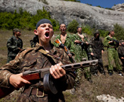 Gerd Ludwig // Cossack Youth Camp, Crimea 2010, Ukraine, Cossackdom, cossack, cultural, culture, historical, history, heritage, traditional, tradition, Crimean, crimea, Cossacks are ideologically strong proponents of Russian heritage and cultivate strong anti-Tatar sentiment. Bakhchisaray. Eski-Kermen boot camp Russian Ukrainian youth youngsters discipline self-discipline, firearms martial arts drills, exercises, and games. Local authorities critic paramilitary, military