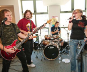Lauren Greenfield // Rock Roll Fantasy middle-aged professionals rocking out songs Rock’n’Roll Fantasy Camp